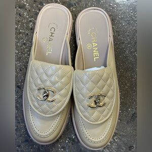 CHANEL 100% leather Nude Slides turn lock cc